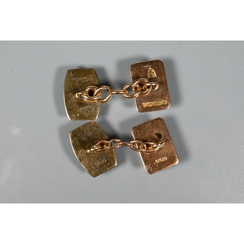 236 - A pair of 9ct yellow gold rectangular cufflinks with chain links, approx 6.5g