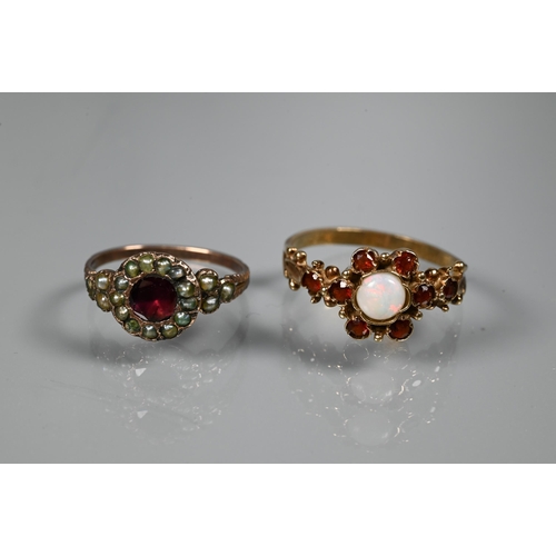 242 - A collection of antique and later jewellery items including two Victorian garnet set rings, oval cam... 