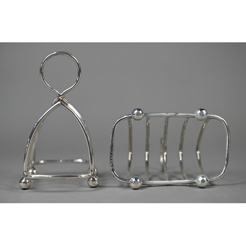 25 - A pair of silver lancet-form wire toast racks, James Deakin & Sons, Sheffield 1920, to/w a half-... 