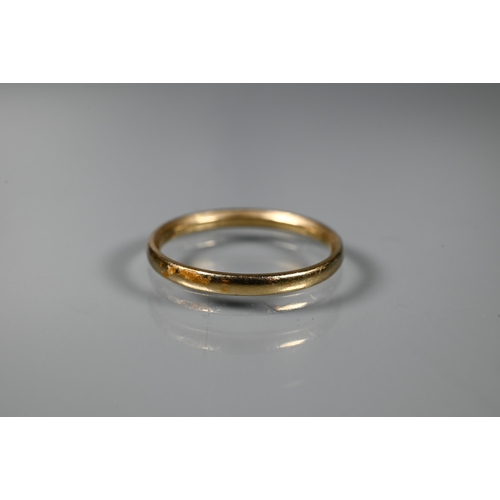 260 - A 9ct yellow gold narrow wedding band, size R, to/w a three stone diamond ring set 18ct and plat (mi... 