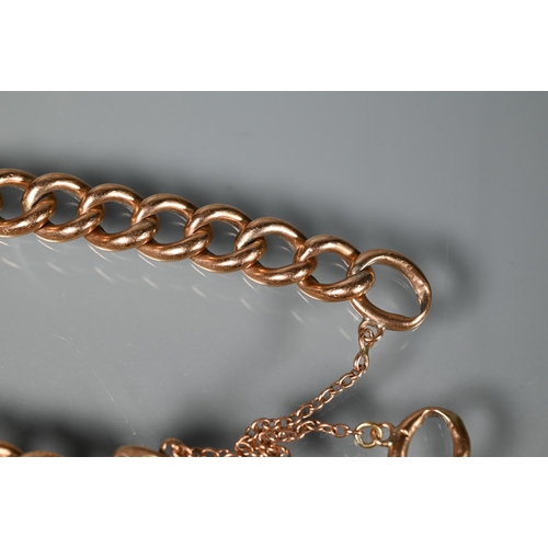 263 - A 9ct rose gold curb bracelet with padlock and safety chain attached, approx 10.5g