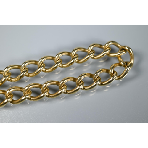 264 - A 9ct yellow gold curb bracelet, with padlock and safety chain attached, approx 32.7g