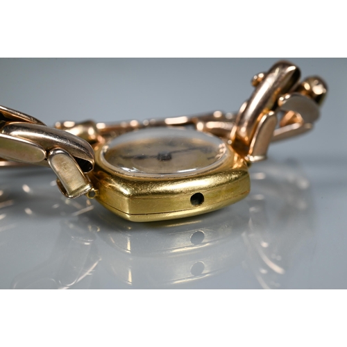 266 - A 9ct ladies wristwatch with square face, on rose gold expanding strap, approx 20g all in