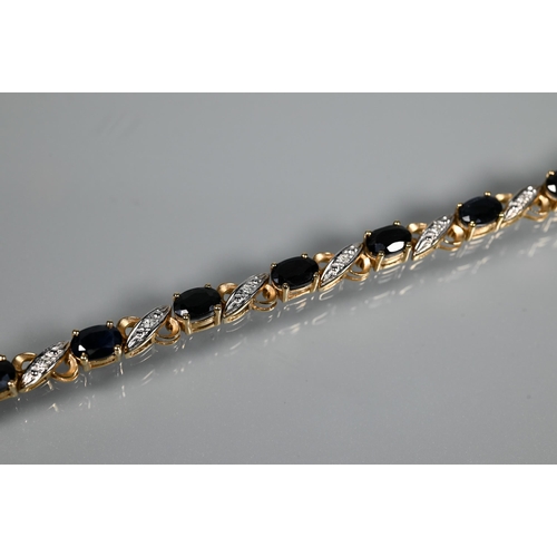 267 - A bracelet set with oval sapphires and diamonds, yellow metal stamped 375; a 9ct yellow gold snake l... 