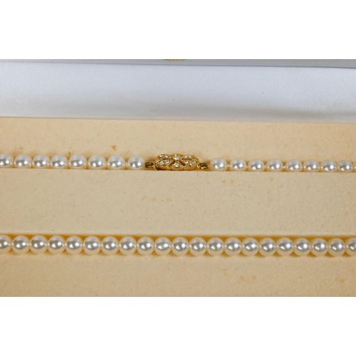 268 - A diamond set bracelet, concealed clasp, set yellow and white metal stamped 9k to/w a 9ct yellow gol... 