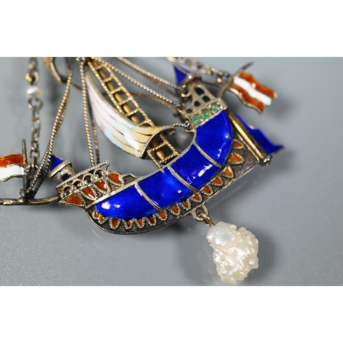 274 - An Austro-Hungarian silver gilt and enamel pendant featuring a tall masted galleon, polychrome ename... 