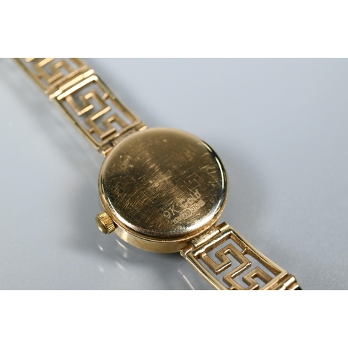 276 - A 9ct gold Rotary watch on Greek key style bracelet strap