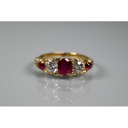 277 - An antique ruby and diamond ring, the three rubies with a briliant diamond to each side and diamond ... 