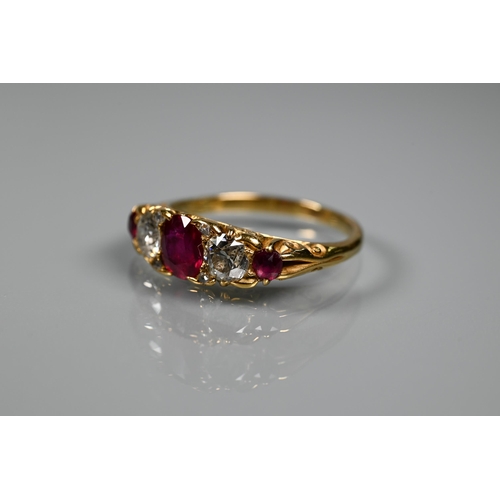 277 - An antique ruby and diamond ring, the three rubies with a briliant diamond to each side and diamond ... 