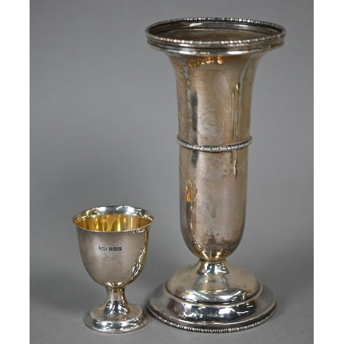 28 - A silver vase-flute on weighted foot, Birmingham 1911, 17cm high, to/w an engraved cigarette case, B... 