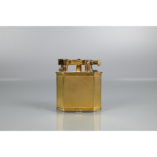 319 - Dunhill - A 9ct yellow gold lighter with engine turned decoration, model no 390107, 4.2 x 3.8cmProv:... 