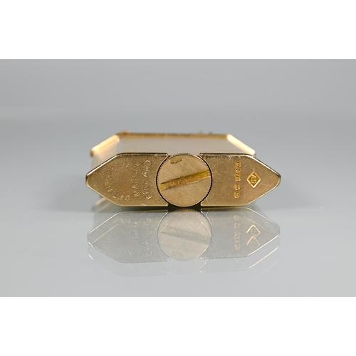 319 - Dunhill - A 9ct yellow gold lighter with engine turned decoration, model no 390107, 4.2 x 3.8cmProv:... 