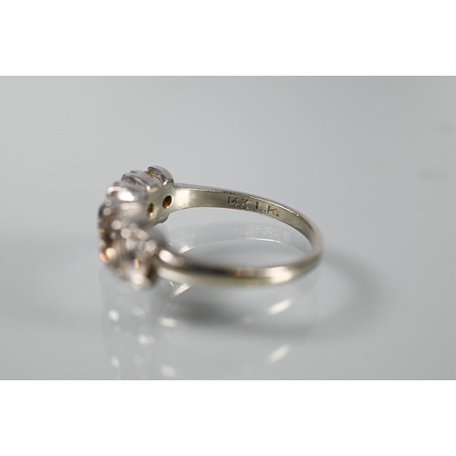 324 - A five-stone diamond ring, white metal stamped 14k, size K 1/2