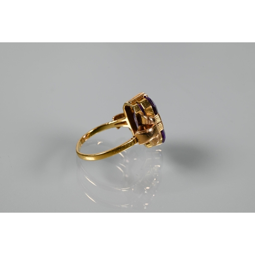 326 - A single stone ring, the rectangular synthetic colour-change sapphire of approx 9.48 carats set yell... 