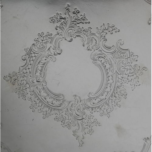 33 - An Edwardian silver letter salver in the Georgian taste, with delicate engraved decoration and mould... 
