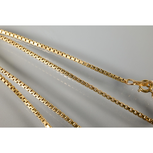 331 - A 9ct yellow gold box link chain with abacus pendant stamped 585 attached, approx 12.4g to/w a pair ... 