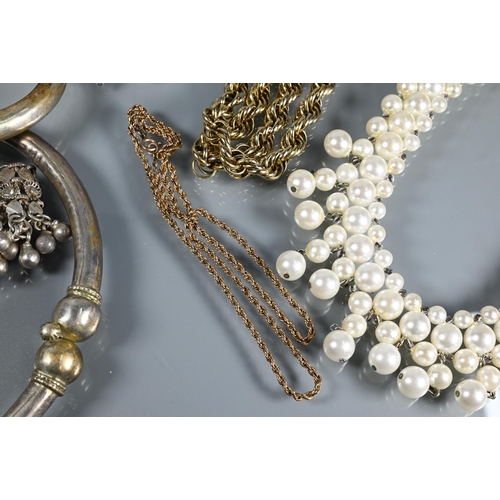 332 - A collection of vintage and other jewellery including gilt metal chains, simulated pearls, two wrist... 