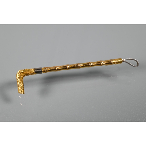 337 - A George III gold guinea dated 1760 (with metal hanger); a Victorian 9ct scroll brooch, a 9ct riding... 