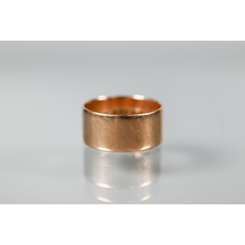 340 - A 9ct rose gold wide wedding band, approx 8mm wide, approx 5.9g, size U