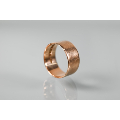 340 - A 9ct rose gold wide wedding band, approx 8mm wide, approx 5.9g, size U