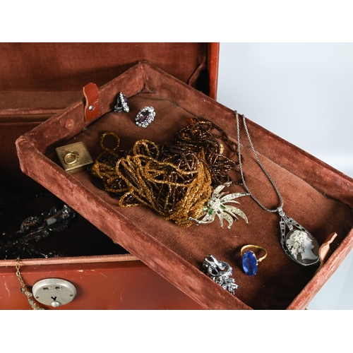 345 - A leather jewel case containing a collection of vintage paste, crystal and other jewellery items