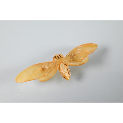 346 - A French Art Nouveau horn winged insect/cicada brooch with outstretched wings, naturalistically carv... 