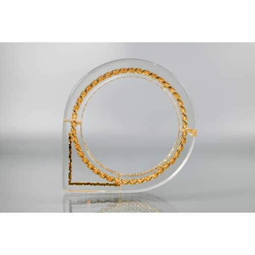 354 - Chanel - A vintage lucite/plexi shaped bangle/bracelet with embedded Chanel motifs - chain and CHANE... 