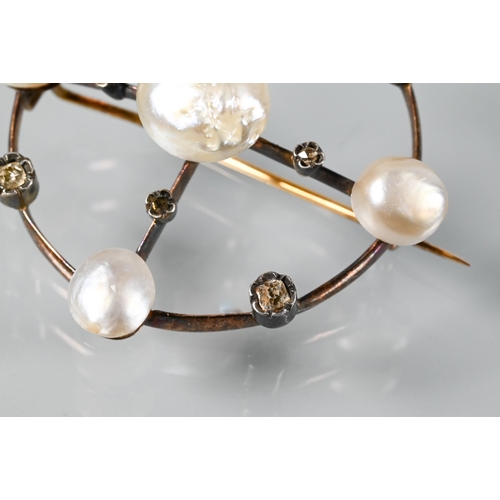 357 - An Edwardian circlet brooch with five pearls on yellow metal knife-edge mount, set with eight rose c... 