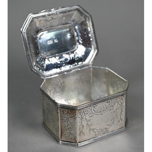 36 - A silver box with moulded hinged lid, canted corners and engraved decoration, London Assay Office (r... 