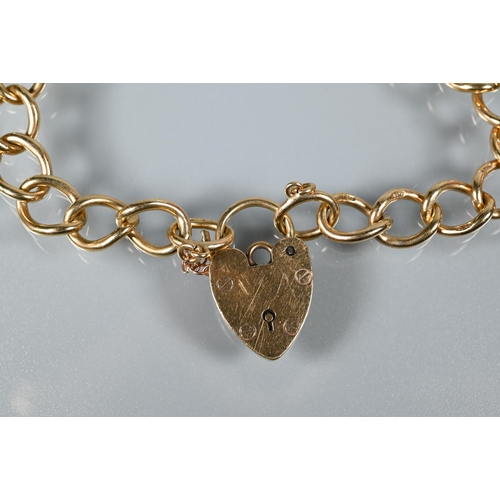 363 - A 9ct yellow gold curb bracelet with padlock and safety chain attached, 15.3g