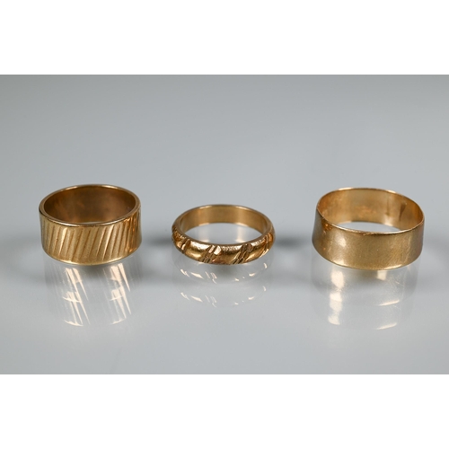 364 - Three various 9ct yellow gold wedding bands, sizes K, Q and J 1/2, approx 9.3g (3)