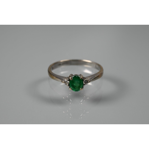 366 - An emerald and diamond three stone ring, 18ct white gold set, size H; a white metal wishbone ring se... 