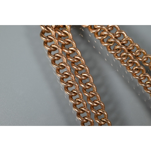 367 - A 9ct rose gold double Albert belcher chain with two swivels, one bar and fob attached, approx 68.1g