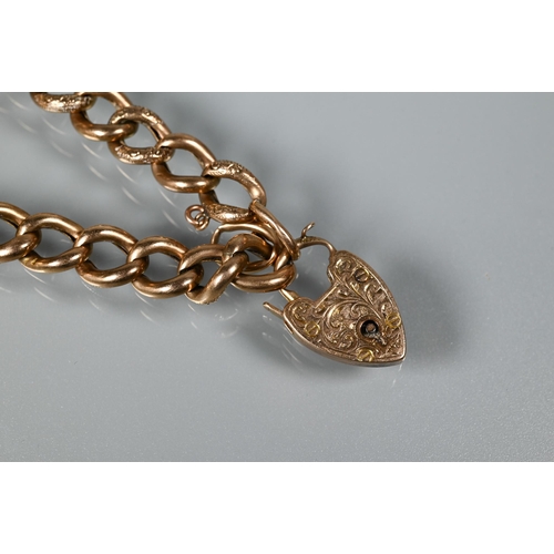 369 - A 9ct rose gold curb bracelet with padlock attached, approx 15.9g