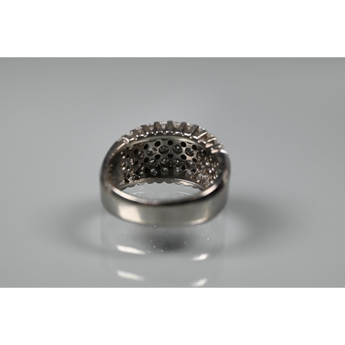 374 - An 18ct white gold bombe style ring set five rows of pave-set diamonds, size M, approx 10.4g all in