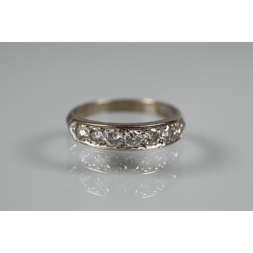 376 - Four various half eternity rings, one 18ct white gold set with seven diamonds, size M; 18ct white go... 