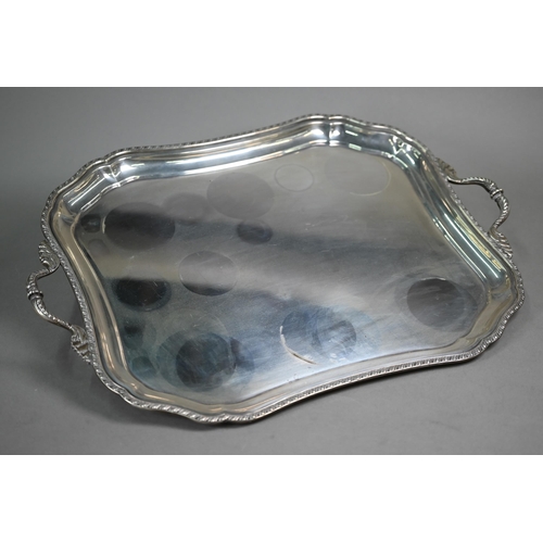 44 - A Continental white metal large tray with foliate handles and gadrooned rim, stamped '925', 65oz, 52... 