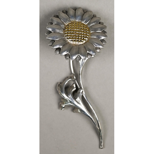 45 - An Italian white metal pomander, modelled as a sunflower with gilt centre, on foliate stem, Milan, s... 