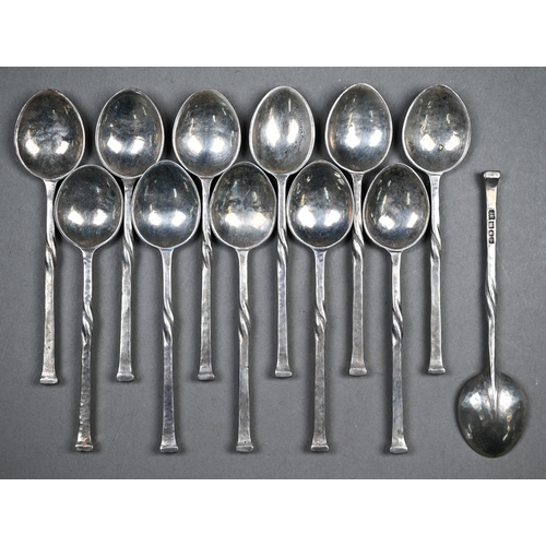 53 - Omar Ramsden:  a cased set of 12 planished silver coffee spoons with seal-tops and twist stems, Lond... 