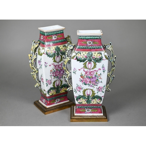 536 - A pair of Samson of Paris 'Chinese Lowestoft' famille rose vases with twin dragon handles, floral de... 