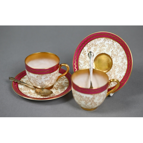 539 - A Royal Worcester set of six coffee cups and saucers with delicate seaweed decoration within gilt an... 