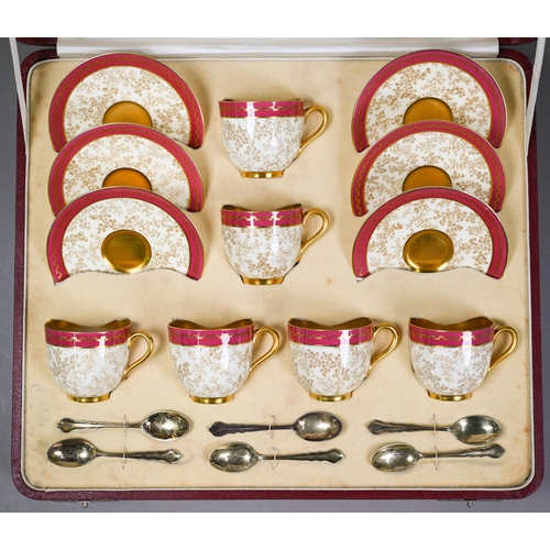 539 - A Royal Worcester set of six coffee cups and saucers with delicate seaweed decoration within gilt an... 