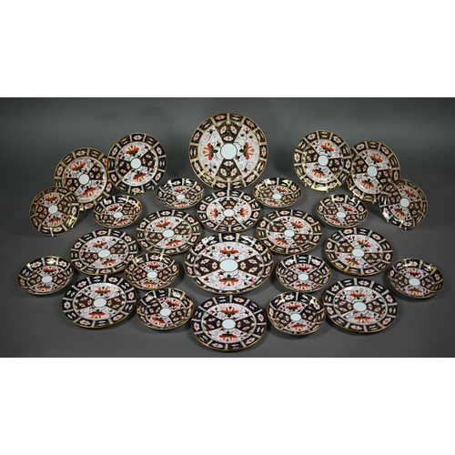 542 - A Royal Crown Derby Imari tea service comprising twelve each cups, saucers and plates, to/w sandwich... 