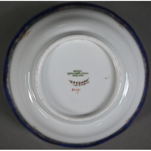 546 - An Edwardian Copeland Spode part dinner/tea service printed with rose vignettes on a blue and gilt r... 