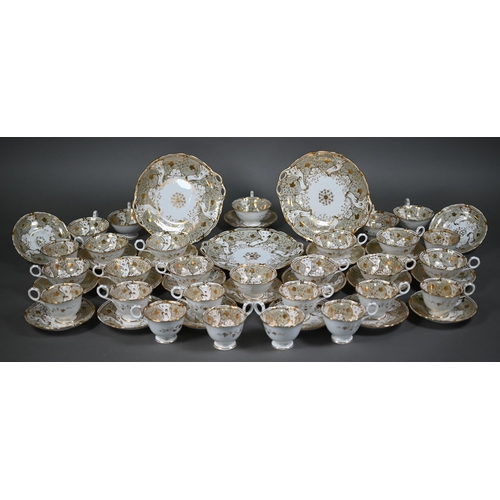 550 - A Victorian Davenport china tea service with gilt decoration on a beige ground, 40 pieces