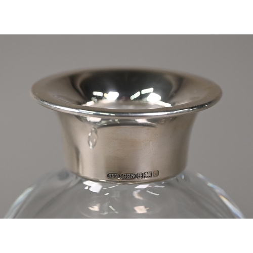 59 - An Atlantis Crystal glass decanter of torus form, with silver collar Birmingham 2008, the stopper et... 
