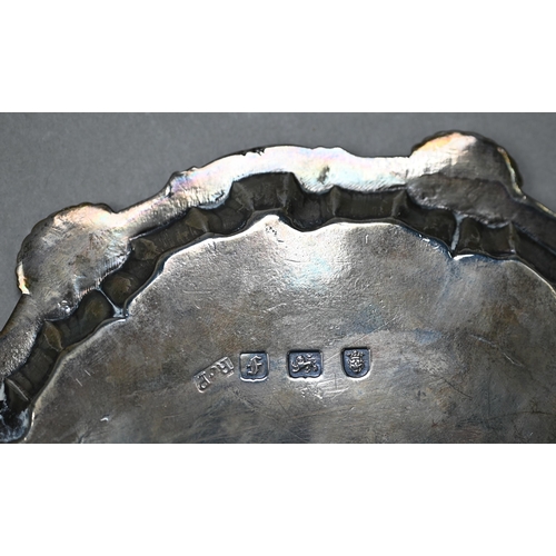 79 - An early George III silver card salver with shell and scroll moulded rim and three hoof feet, Richar... 