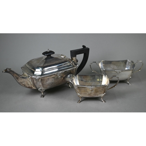 87 - A heavy quality oblong silver three-piece tea service with moulded rims and hoof feet, ebonised fini... 