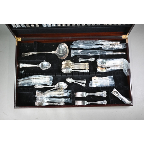 13 - An extensive set of epns Kings Pattern cutlery for twelve settings - little used or as new - in leat... 