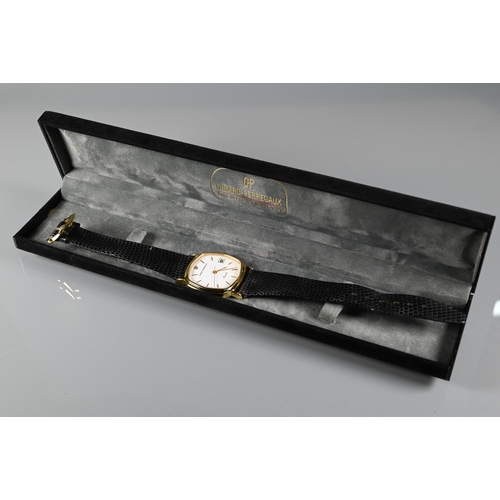 424 - Girard Perregaux, a gent's yellow metal cased wristwatch, quartz movement on leather strap, in fitte... 